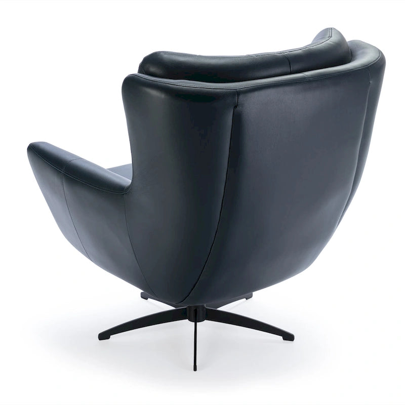 Fauteuil pivotant capitonné en similicuir