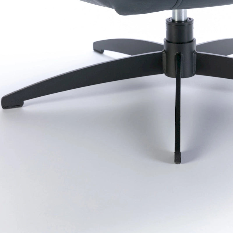 Fauteuil pivotant capitonné en similicuir