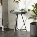 Table basse ronde industrielle en métal avec horloge